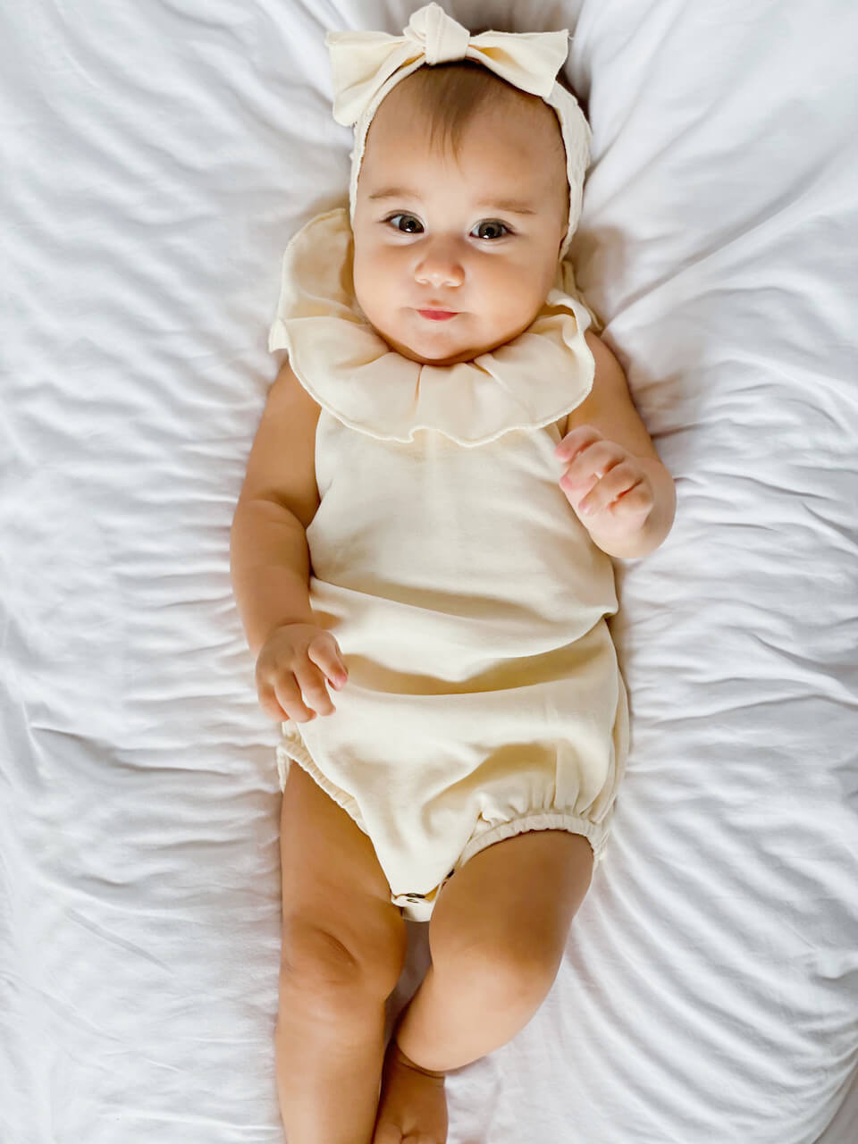 Sleeveless Ruffle Bodysuit in Beige