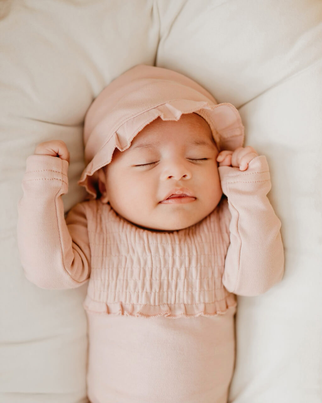 Organic Smocked Footie in Rosewater